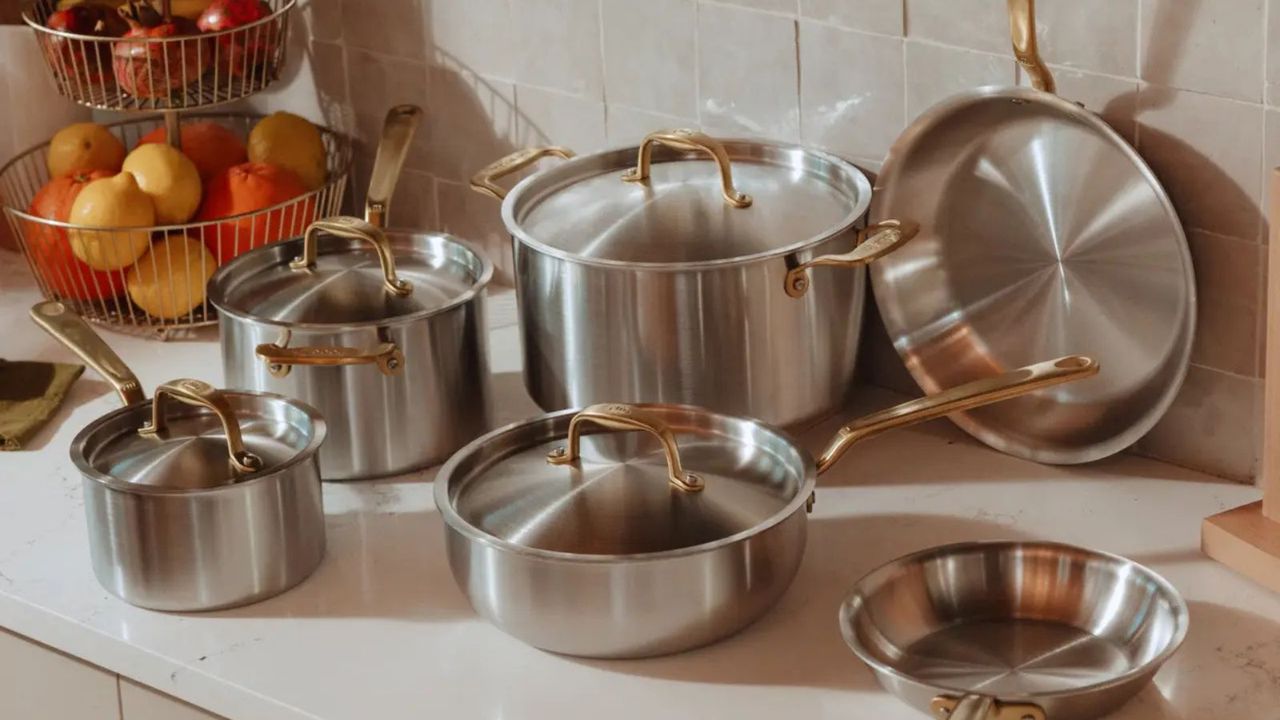 A selection of Made In Stainless Steel Pans with gold tone handles