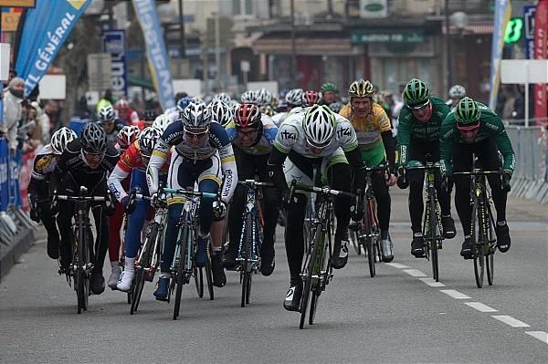 Head down, Kittel powers away from the rest.