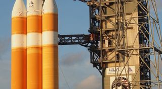 A Delta 4 Heavy rocket carrying a payload for the National Reconnaissance Office prepares to lift off June 11 from Cape Canaveral Air Force Station.