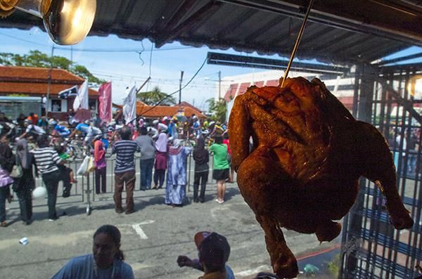 The peloton would have roasted beneath the sun on another hot day in Malaysia!