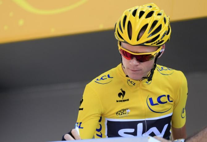 Tour de France leader Chris Froome signs on for stage 9, the Sky rider's first stage in the yellow jersey