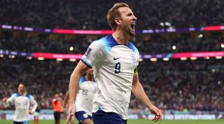 Harry Kane celebrating becoming the England top scorer against France