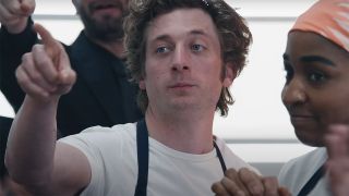 Carmy pointing at someone off-camera in The Bear season 4