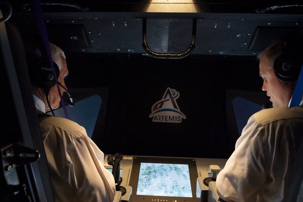 Vice President Mike Pence (left) and NASA Administrator Jim Bridenstine take a spin in NASA Ames Research Center&#039;s Vertical Motion Simulator on Nov. 14, 2019.