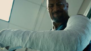Dwayne Johnson flexes his arm cast off in Furious 7