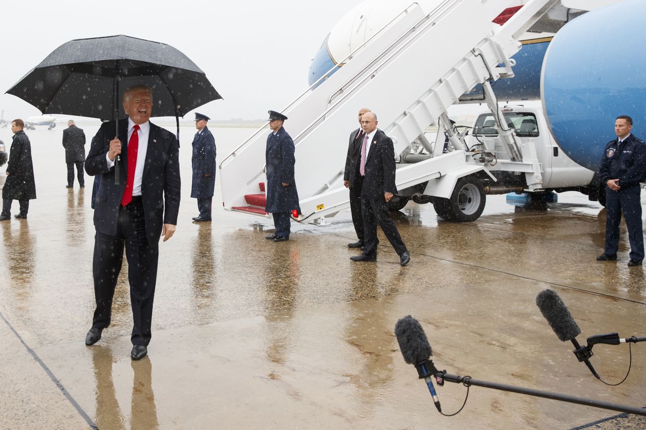 President Trump speaks with reporters after firing Reince Priebus