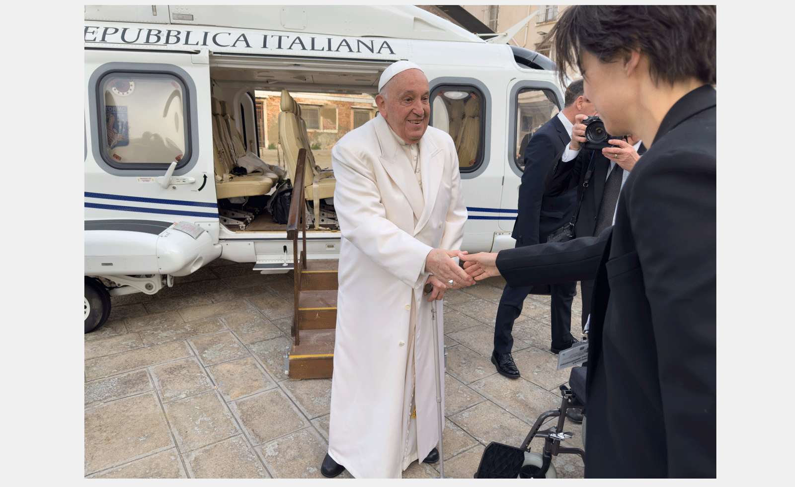 Juergen Teller photograph of Pope shaking hands
