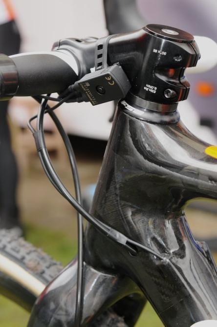 With such a tiny stem, and almost no space beneath it, Shimano's Di2 control box is positioned to one side. The Di2 cable and rear hydraulic hose both run in to the left side of the down tube.