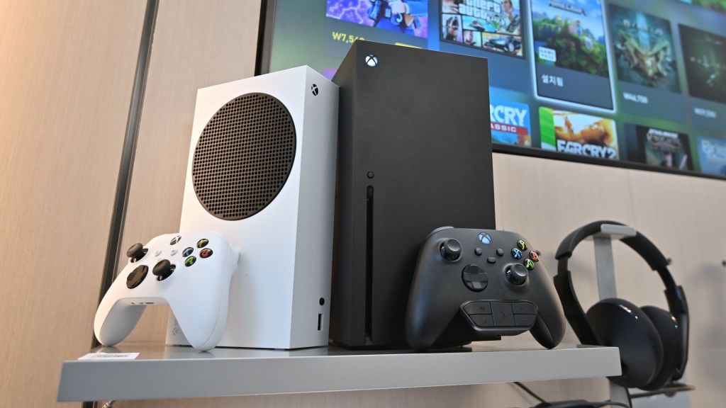 Microsoft&#039;s Xbox Series X (black) and series S (white) gaming consoles are displayed at a flagship store of SK Telecom in Seoul on November 10, 2020. 