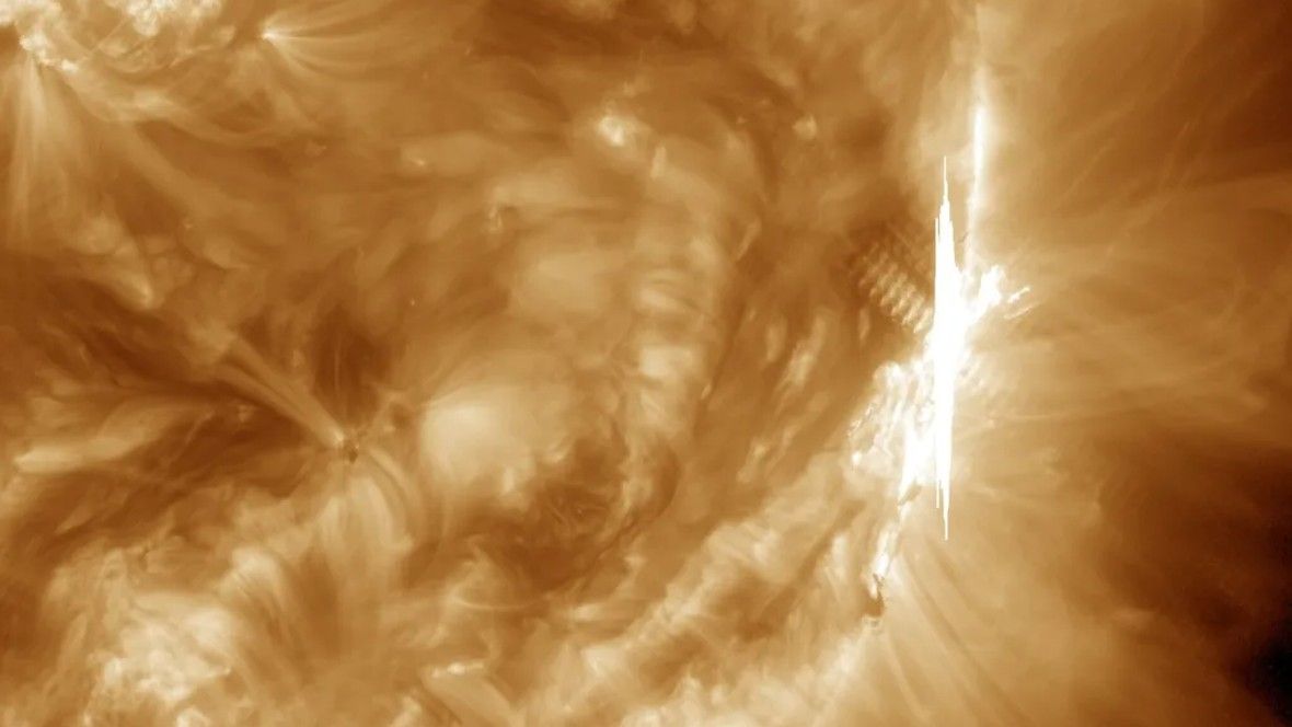 NASA’s Solar Dynamics Observatory captured this image of a X1.4 solar flare — seen as the bright flash on the right — on Oct. 9, 2024.