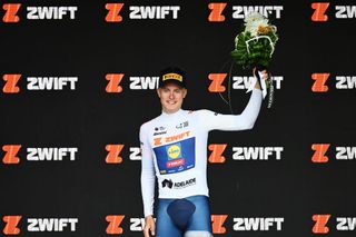 URAIDLA AUSTRALIA JANUARY 23 Albert Withen Philipsen of Denmark and Team Lidl Trek celebrates at podium as White best young jersey winner during the 25th Santos Tour Down Under 2025 Stage 3 a 1475km stage from Norwood to Uraidla 491m UCIWT on January 22 2025 in Uraidla Australia Photo by Dario BelingheriGetty Images