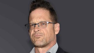 Jason Newsted posing for a photograph in the early 2020s