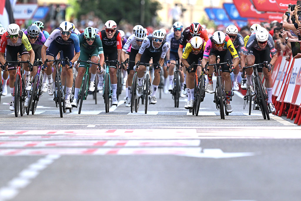 ZARAGOZA, SPAIN - AUGUST 30: (L-R) Ethan Vernon of Great Britain and Team Israel - Premier Tech, Mads Pedersen of Denmark and Team Lidl - Trek - Green Points Jersey, Fabio Christen of Switzerland and Team Q36.5 Pro Cycling, Elia Viviani of Italy and Team Lotto and stage winner Jasper Philipsen of Belgium and Team Alpecin - Deceuninck sprint at finish line during the La Vuelta - 80th Tour of Spain 2025, Stage 8 a 163.5km stage from Monzon Templario to Zaragoza / #UCIWT / on August 30, 2025 in Zaragoza, Spain. (Photo by Dario Belingheri/Getty Images)