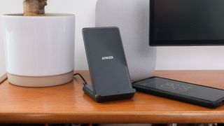 Anker 313 Wireless Charging Stand on a wooden surface