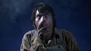 Stephen King with hand over mouth in Creepshow