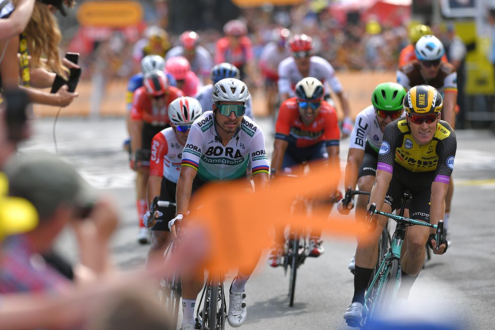 Mike Teunissen (Jumbo-Visma), beats Peter Sagan (Bora-Hansgrohe) and Caleb Ewan (Lotto Soudal) to win the opening stage at the Tour de France in Brussels