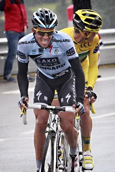 Tour leader Thomas Voeckler looks back to see the peloton's reaction to Alberto Contador's attack.