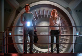 A pair of travelers (played by Chris Pratt and Jennifer Lawrence) on an interstellar journey emerge from hibernation 90 years early in Sony Pictures's sci-fi thriller "Passengers."