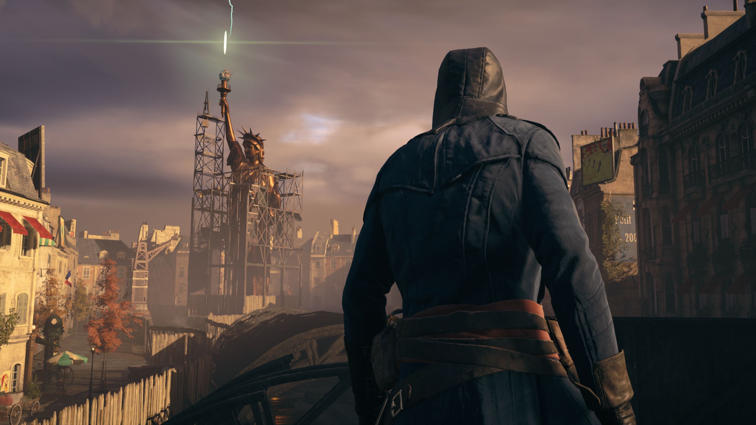 A hooded assassin looks at the Statue of Liberty as it's struck by lightning