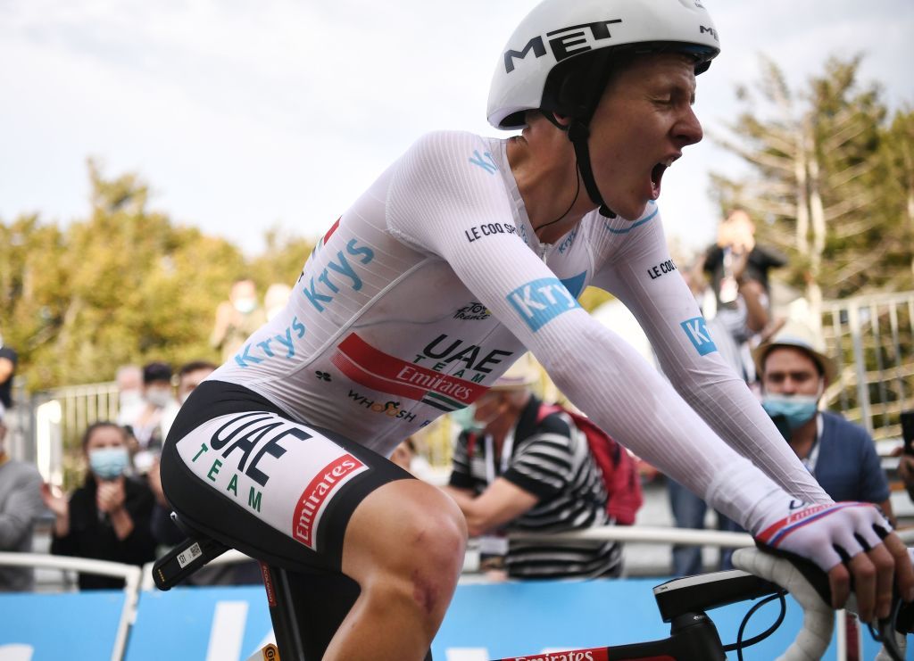 Team UAE Emirates rider Slovenias Tadej Pogacar wearing the best youngs white jersey crosses the finish line at the end of the 20th stage of the 107th edition of the Tour de France cycling race a time trial of 36 km between Lure and La Planche des Belles Filles on September 19 2020 Photo by Marco Bertorello various sources AFP Photo by MARCO BERTORELLOAFP via Getty Images