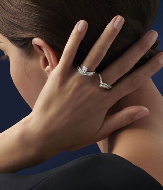 Woman wearing diamond rings Collection