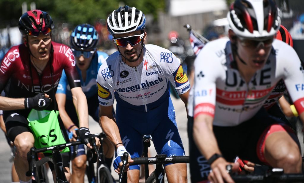Team Deceuninck rider Frances Julian Alaphilippe C compete during the fourth stage of the 72nd edition of the Criterium du Dauphine cycling race 153 km between Ugine and Megeve on August 15 2020 Photo by AnneChristine POUJOULAT AFP Photo by ANNECHRISTINE POUJOULATAFP via Getty Images