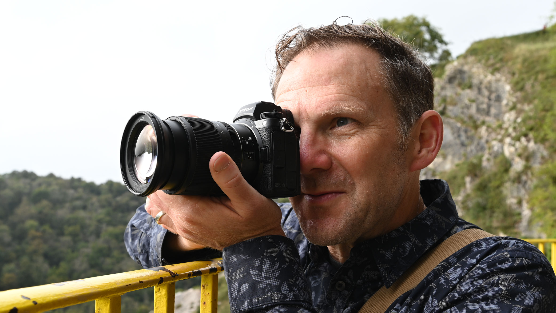 someone holding the Nikon Z6 II