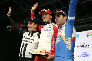 Standing on the podium alongside WorldTour rivals helps teams land wildcard invites