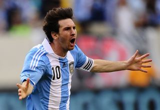 Lionel Messi celebrates after scoring his third goal for Argentina against Brazil in June 2012.