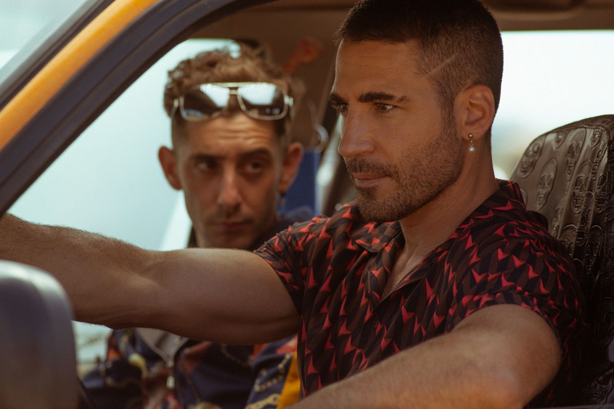 Miguel Angel Silvestre as Moises and Enric Auquer as Christian in "Sky Rojo" on Netflix.