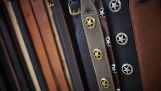 A collection of guitar straps