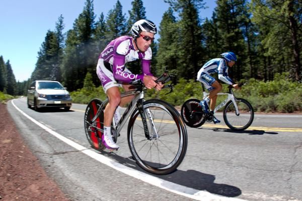 Riders split the lane as they work to pass.