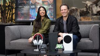 Asha Sharma and Phil Spencer seated together