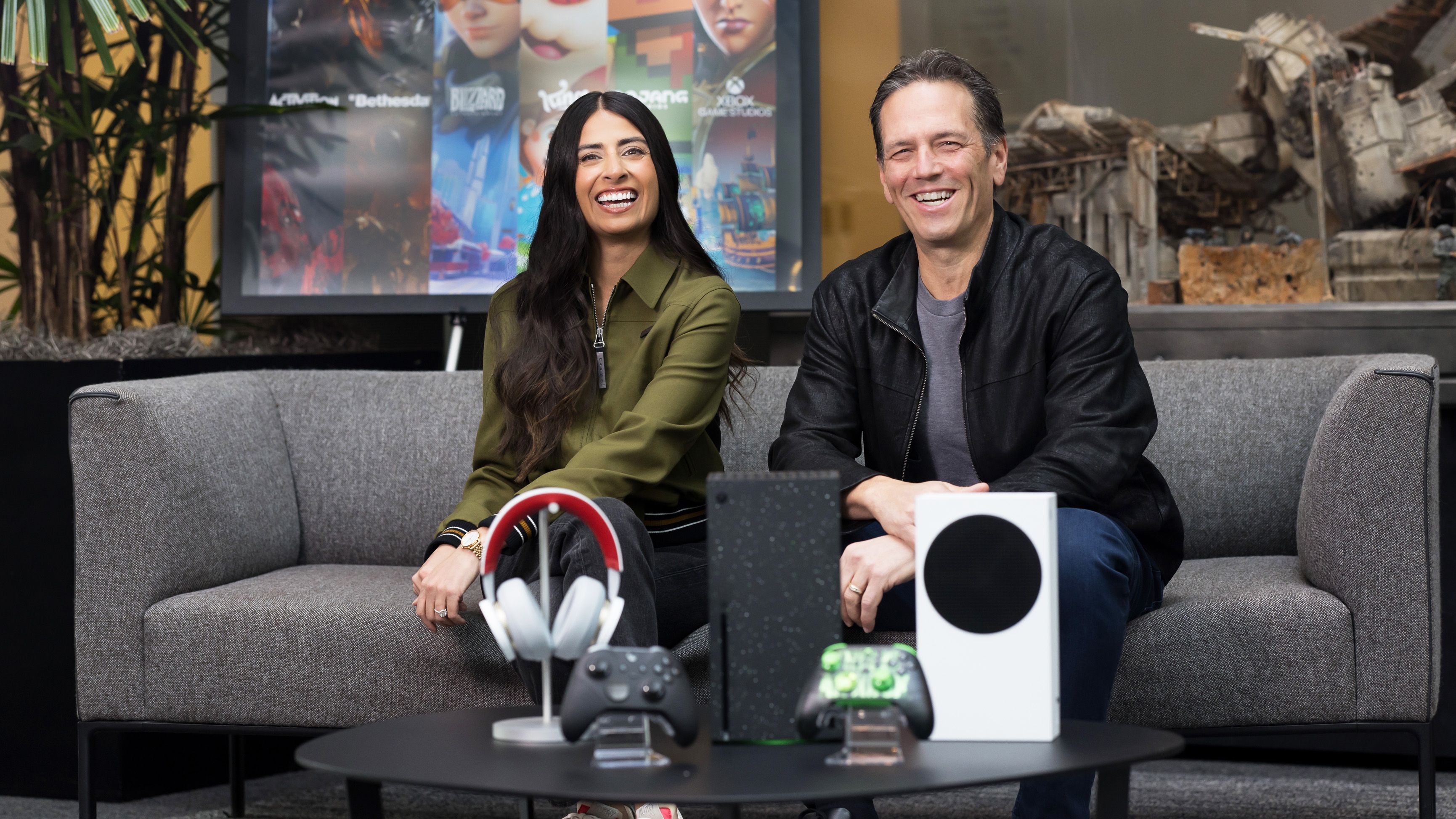 Asha Sharma and Phil Spencer seated together