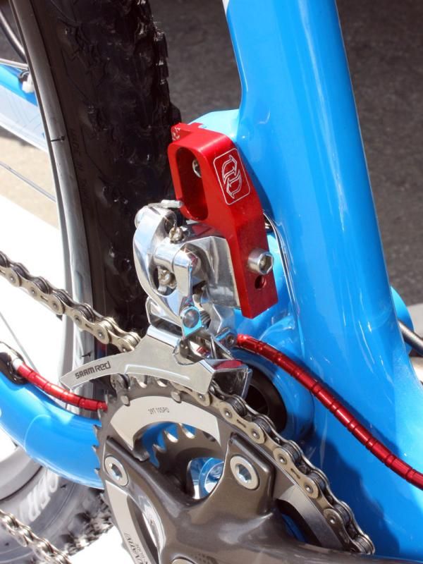Subaru-Gary Fisher has come up with a far more elegant front derailleur mounting solution with the help of a local machinist.