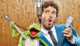 The Muppets Bret McKenzie playing banjo with Kermit The Frog