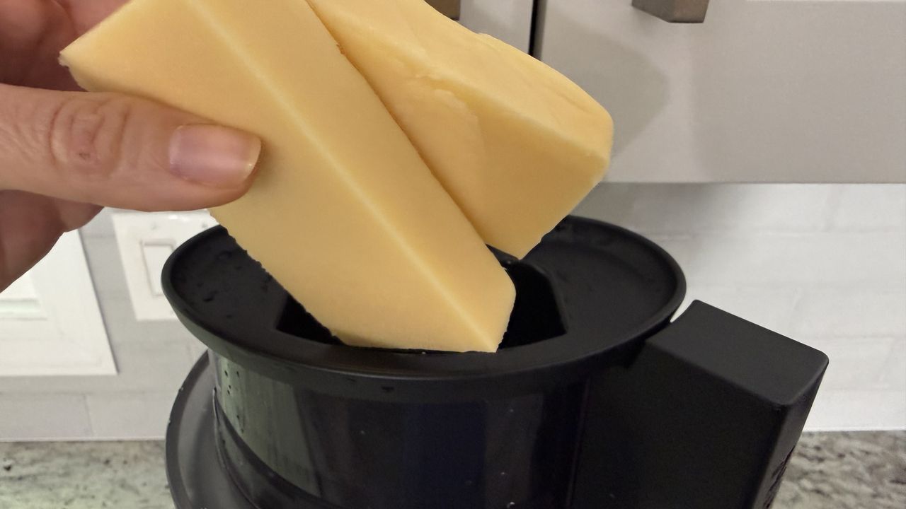 Ninja CrushBOSS shredding Swiss cheese