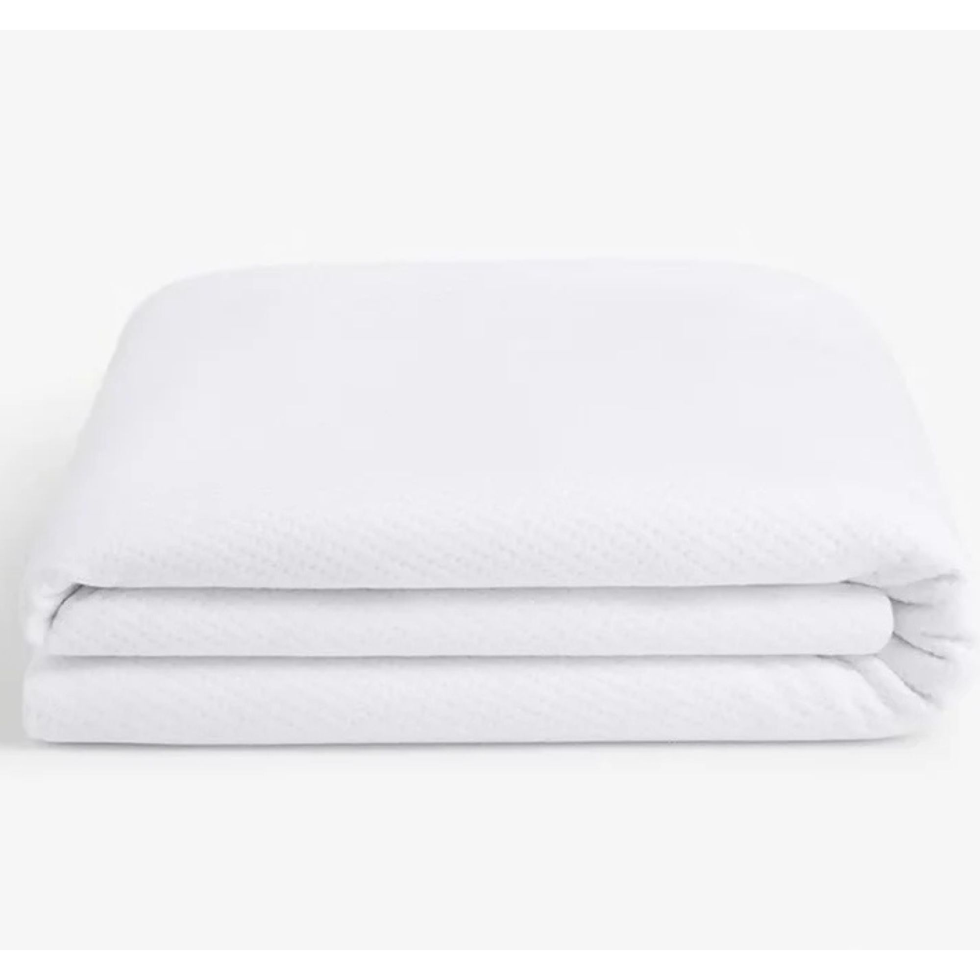 Folded mattress protector in white