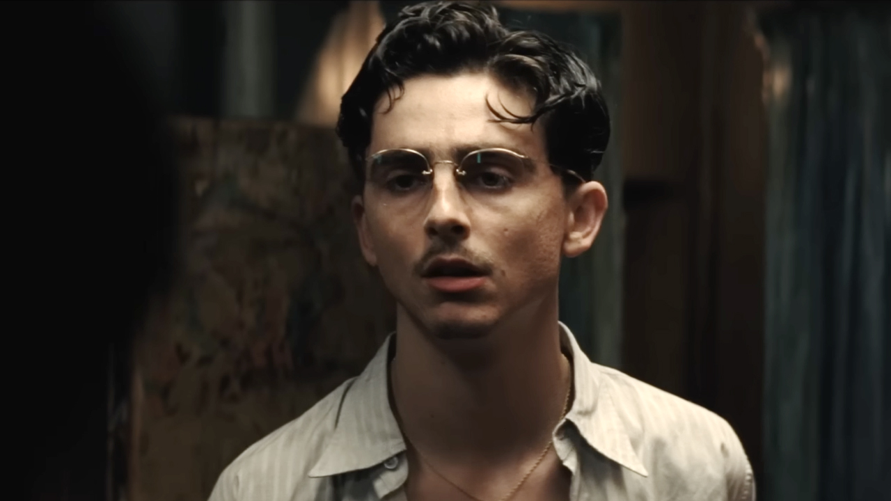 Timothee Chalamet, glasses and small mustache, Marty Supreme (2025). 