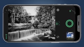 An iPhone capturing a long exposure photo of a waterfall