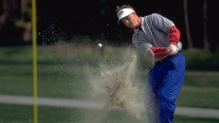 Charley Hoffman takes a shot during a college golf tournament