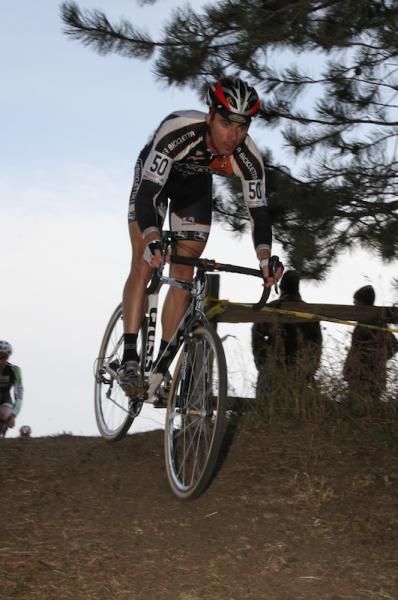 After the Cycle-Solutions stairs, Mike Garrigan (La Bicicletta / J. Lindeberg) comes down the steep drop