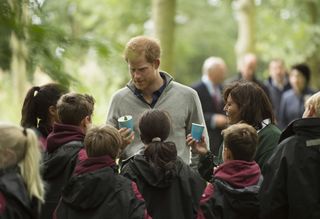 Prince Harry samples nettle tea with Felstead Prep School year 7 pupils as he visits The Chatham Green Project, a conservation and educational initiative run by the Wilderness Foundation in Chatham Green, available to all schools in Essex, on September 14, 2017 near Chelmsford, England.