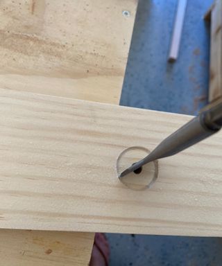 drilled hole and recess for ladder dowels for a DIY loft bed - Brooke Waite