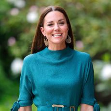 Kate Middleton arriving at the Design Museum in a jewel green dress to present The Queen Elizabeth II Award for British Design