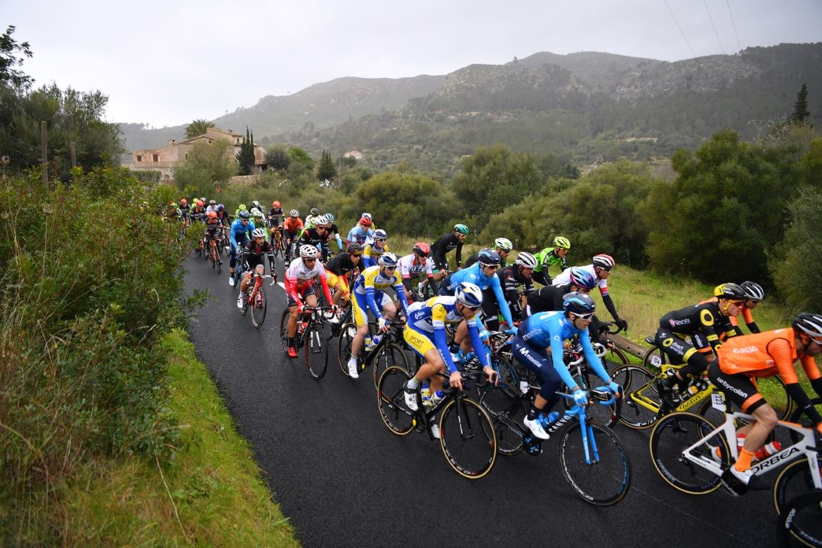The peloton rides by