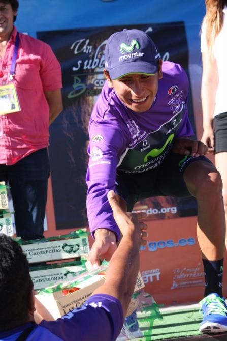 Nairo Quintana was awarded his own weight in cherries after the stage and shared them with the Colombians who were there