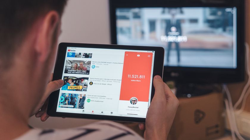 Man watching YouTube video on tablet