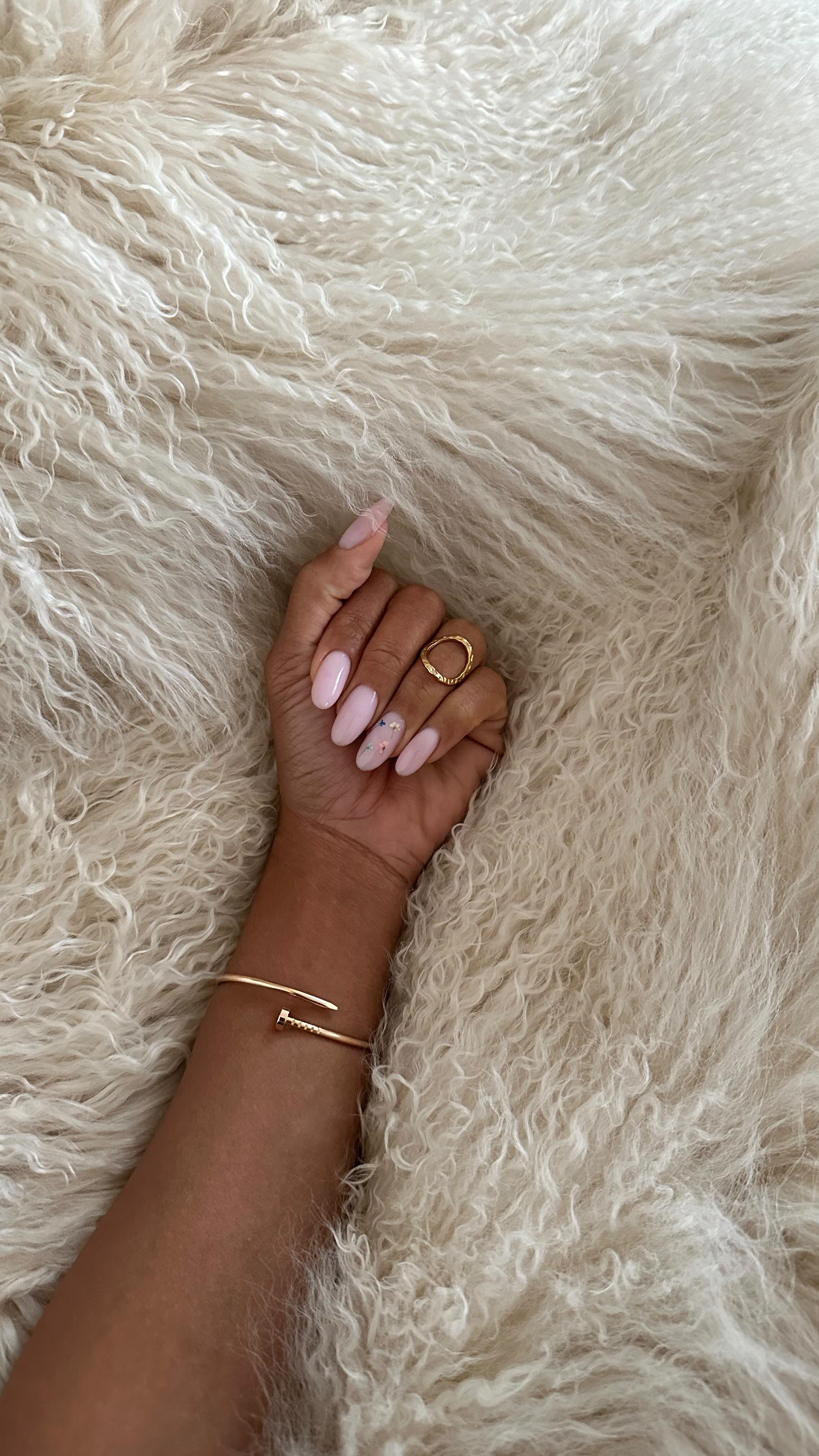 An image of @slipintostyle wearing the Cartier Juste Un Clou bangle.