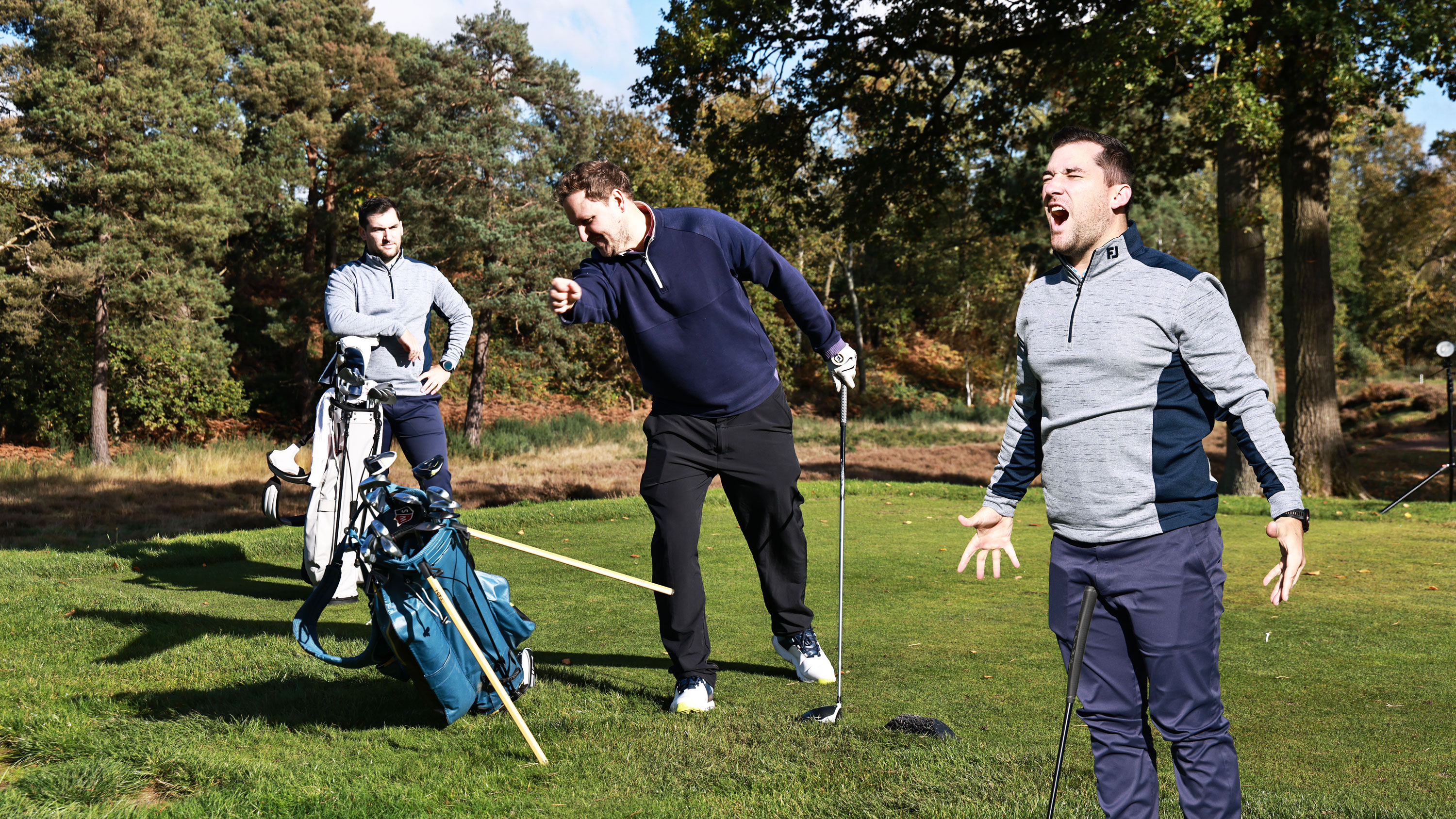 Sam De&#039;Ath screaming in frustration on the golf course, while his playing partner Nick Bonfield pushes his golf bag over in anger